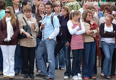 A crowd waiting to see the Royal family